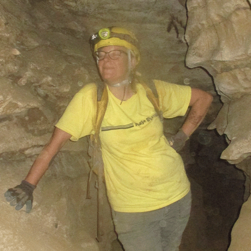 Gretchen Eggiman trowels a test unit floor in North Georgia.